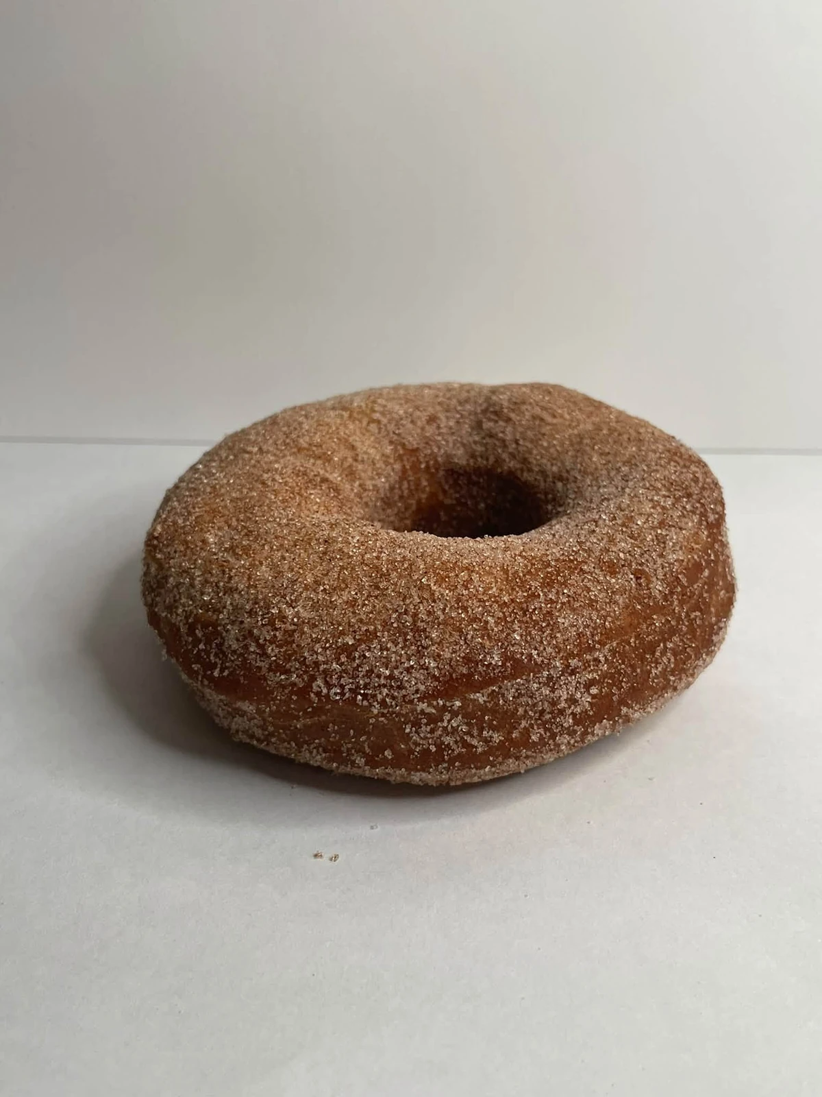 Apple cider cake donut with cinnamon sugar