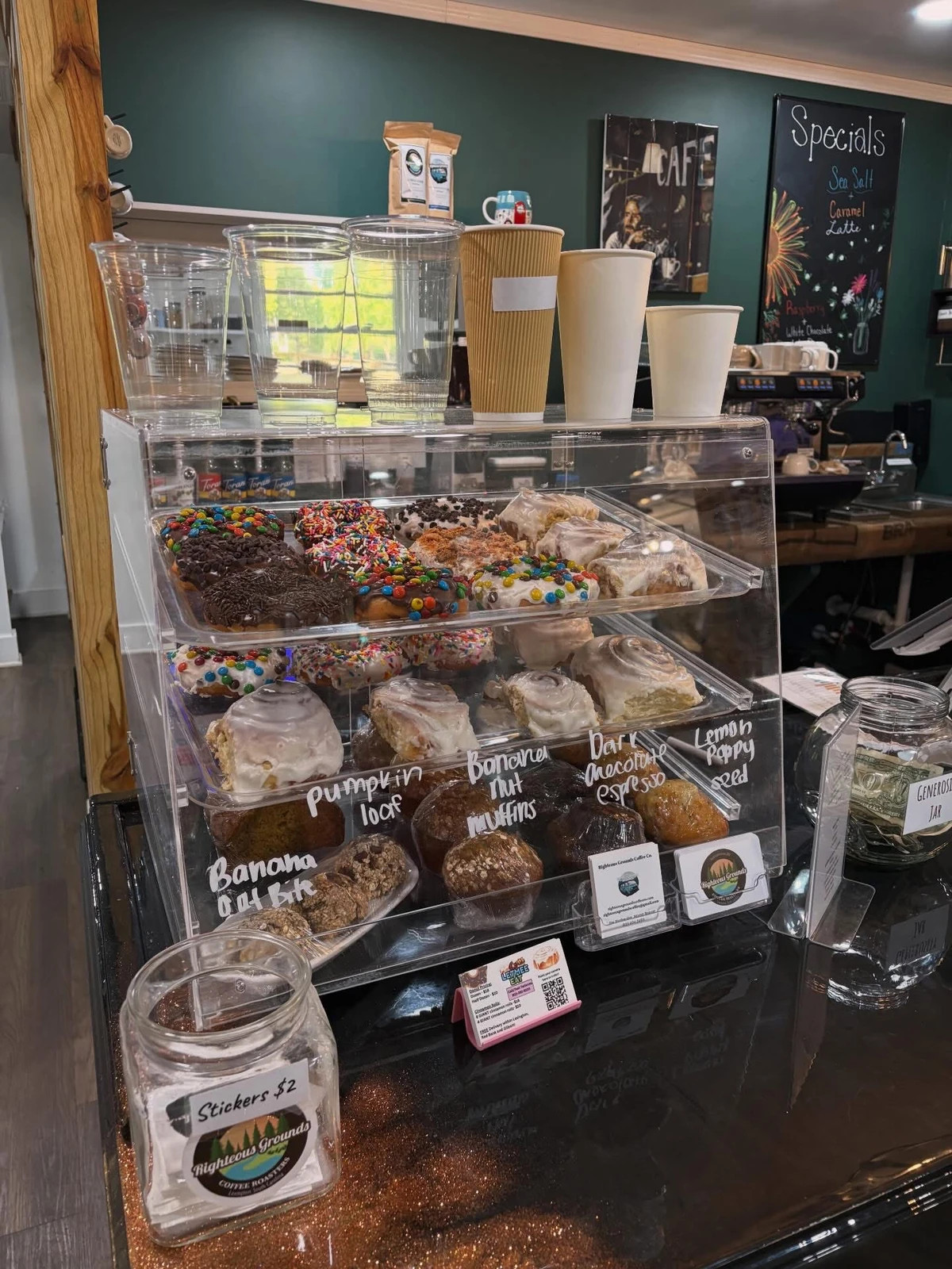 LETMEE EAT donuts on display at Righteous Grounds