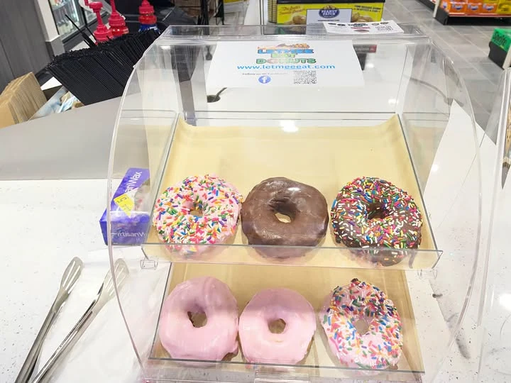 Assorted donuts with strawberry frosting